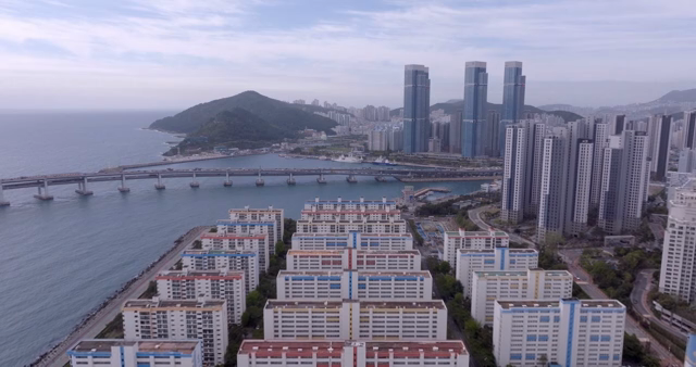 A coastal city with tall skyscrapers