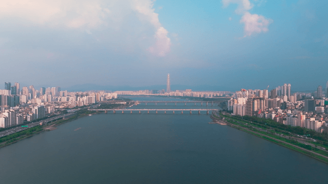 Vast Han River with bridge connecting downtown Seoul