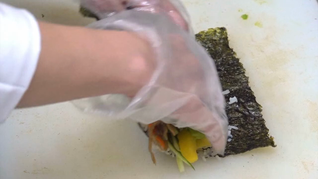 Preparing gimbap with fresh ingredients