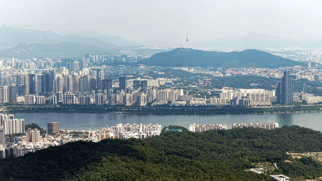 Expansive view of a bustling city with rivers
