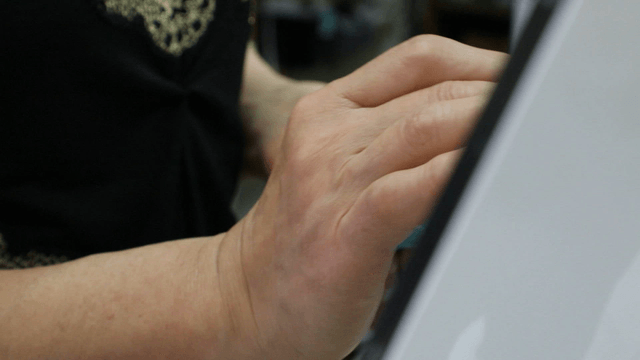 Person using a POS machine at a store