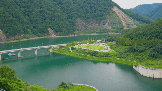 Beautiful lake surrounded by green mountains