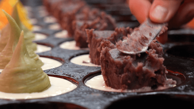 Red bean paste placed on red bean cake batter