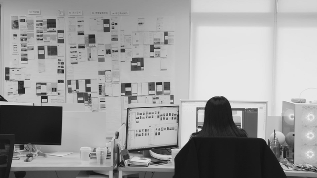 Office worker focused on computer screen