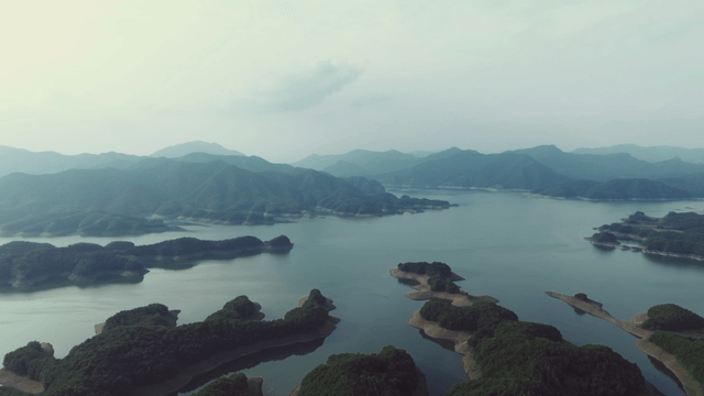 Tranquil lake surrounded by mountains