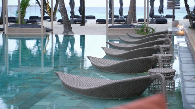 A serene beachside resort with a pool