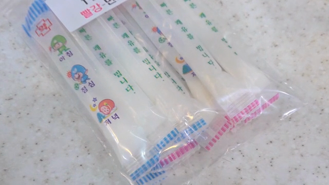 Pack of medicine sachets on a table
