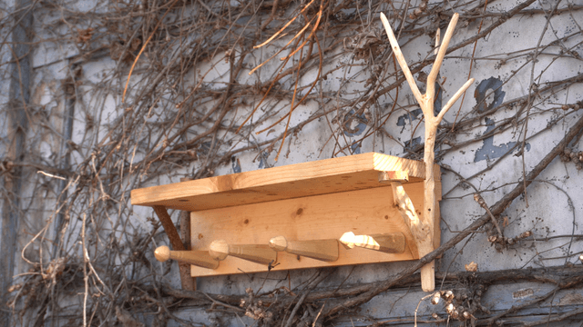 Wooden shelf on a vine-covered wall