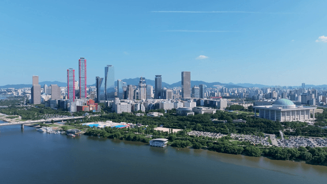 Wide view of Seoul with river and skyscrapers
