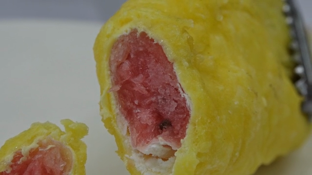Watermelon-shaped ice cream coated in batter and fried