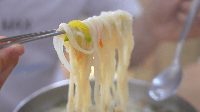 Chewy hand-cut noodles eaten with chopsticks