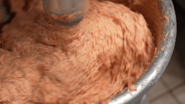 Meat mixture for sausages blending in large mixer