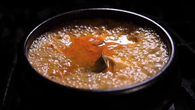 Soybean paste jjigae boiling in a hot pot
