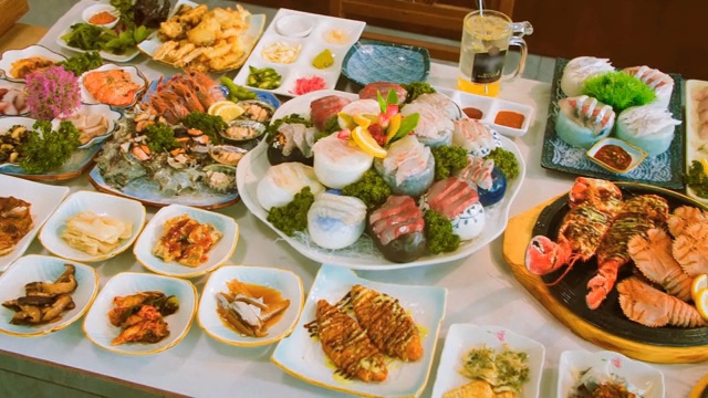 A variety of fresh seafood dishes on a table