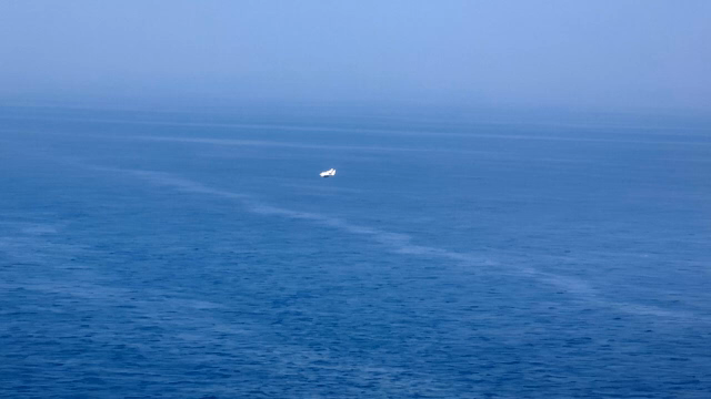 Drone flying over the vast ocean