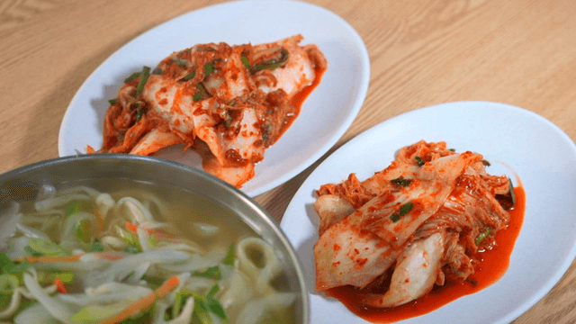 Hand-cut noodles served with kimchi