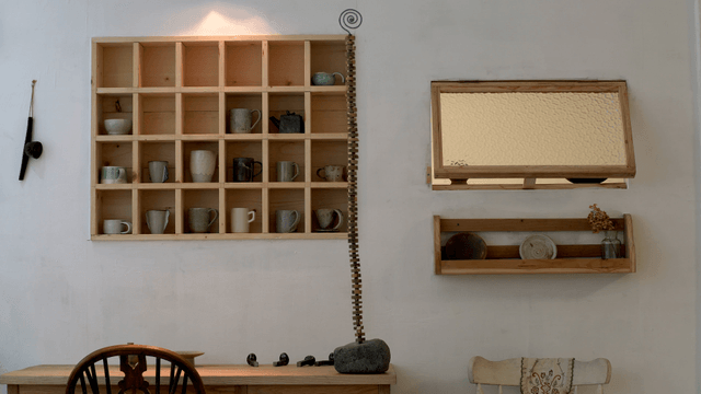 Cozy indoor space with pottery display