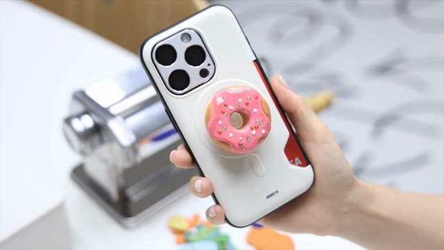 Smartphone with a donut-shaped grip