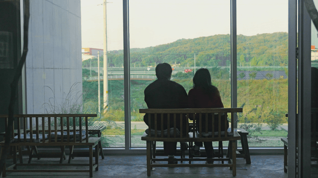 Couple sitting in cafe enjoying the view