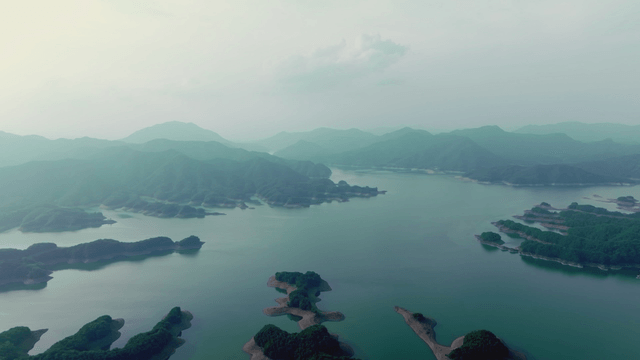 Tranquil lake surrounded by mountains