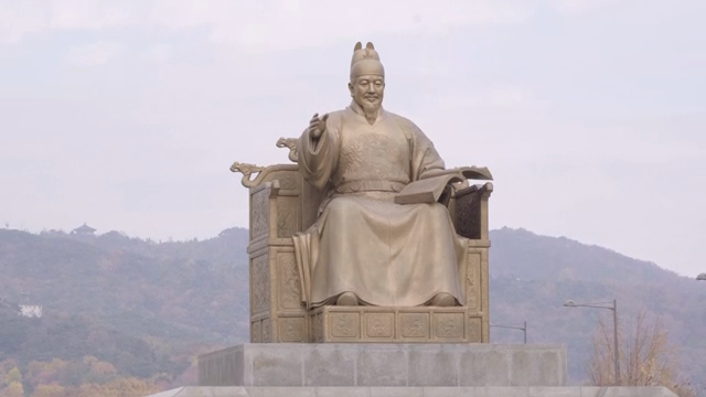 Statue of King Sejong in a city square
