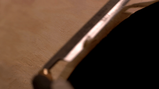 Woodcraft artisan refining wooden surface