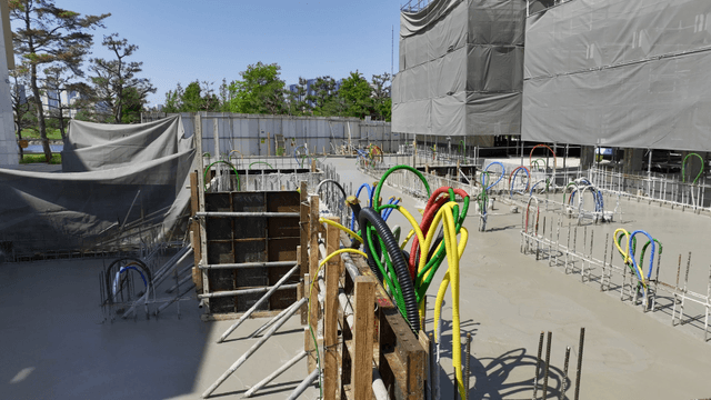 Construction site with concrete and pipes