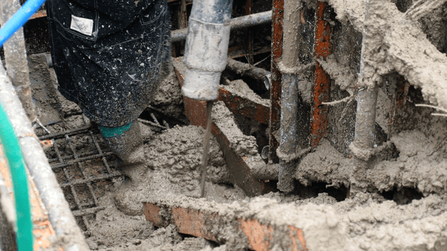 Concrete being poured at a construction site