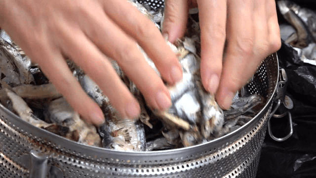 Dried anchovies and sand lances added into broth pot