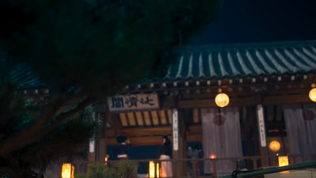 People dancing in a traditional Korean house