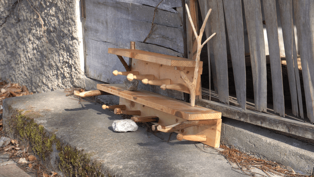 Wooden shelf on a concrete surface
