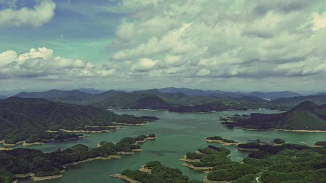 Vast lake surrounded by lush mountains