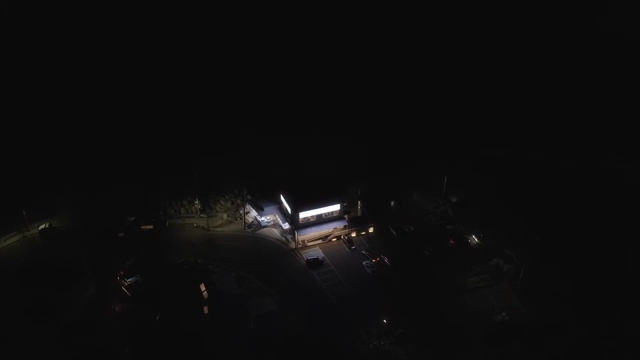 A building illuminated at night