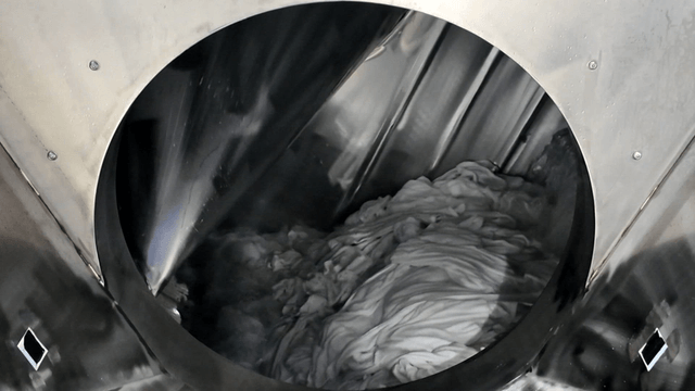 Clothes washed in large factory machine