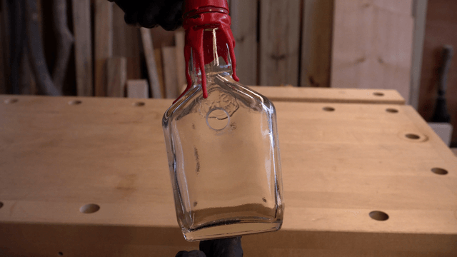Glass bottle on a wooden table