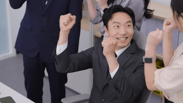 Office team celebrating a success