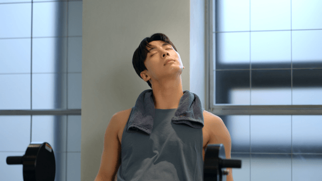 Man resting after workout in gym