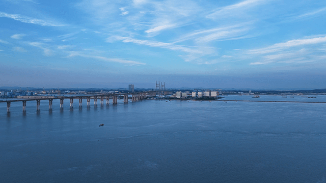 Vast bridge over a calm blue sea