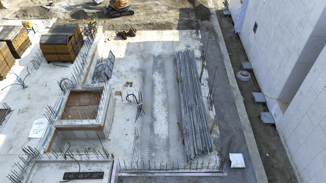 Construction site with materials and machinery