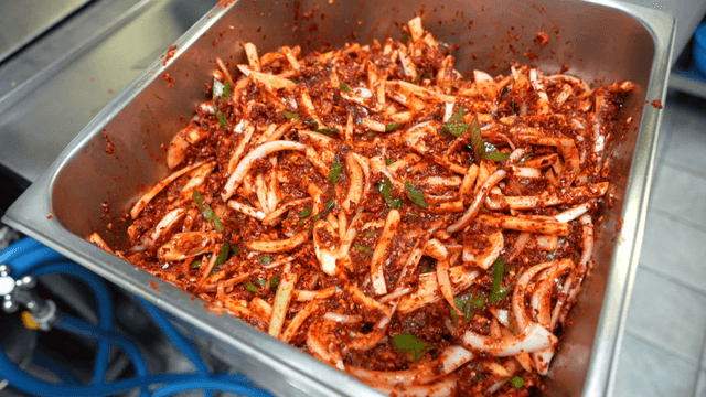 Kimchi chili ingredients in stainless container