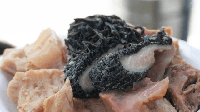 Beef tripe boiled dish on white plate