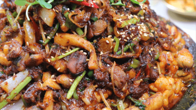 Spicy stone plate cod with stir-fried vegetables and milt