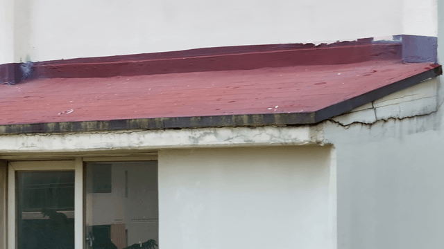 Exterior wall with visible cracks