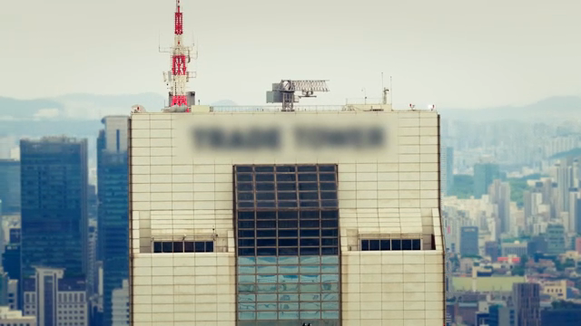 Skyscraper with antenna and city view