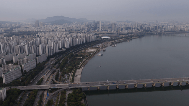 Sprawling cityscape with a river view