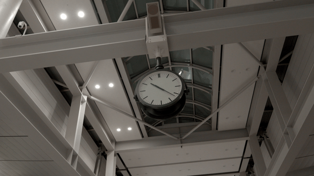 Ceiling clock inside a modern building
