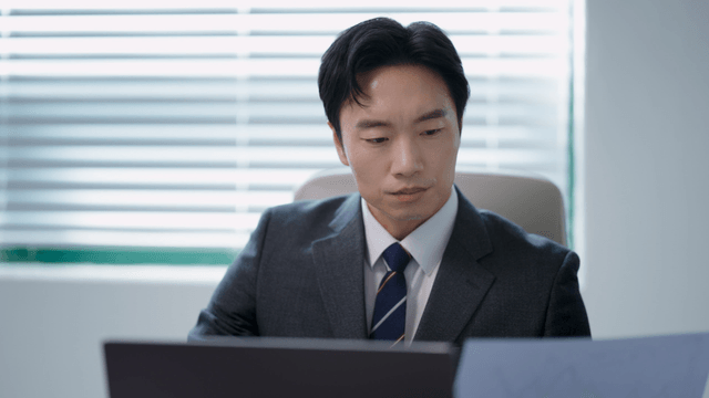 Businessman working at a desk with a laptop