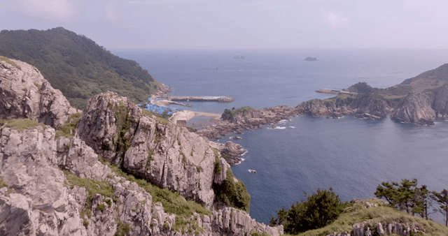 Rocky coastline with distant ocean view