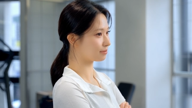 Smiling young woman in a gym