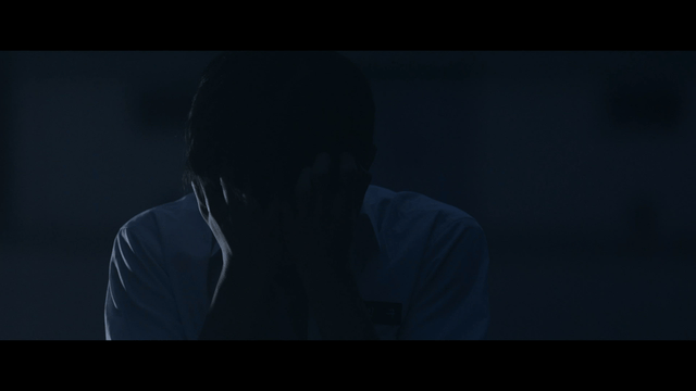 Student frustrated in dark place